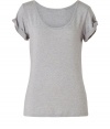 Super-soft staples in neutral hues are a must in any womans wardrobe, and See by Chloes heather grey t-shirt is an easy addition - Slim cut tapers gently through waist - Especially comfortable thanks to a touch of stretch - Flattering scoop neck and cuffed short sleeves - Casually cool, easily dressed up or down - Pair with a pencil skirt and ballet flats, or with skinny denim and ankle booties