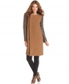 Presenting the most chic way to cover up: BCBGMAXAZRIA's coat combines unique coated-knit sleeves with clean lines and an asymmetrical closure.