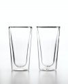 Double-duty drinkware. This set of Duos highball glasses from Luigi Bormioli features two layers of glass blown together for a cool floating look, smart insulation and lasting durability. The innovative design keeps hot drinks hot-but not too much to handle-and cold drinks chilled without making the glass sweat.