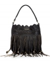 Channel your inner hippie-chic with this flirty fringe design from Roxy. Uninhibited and effortlessly on-trend, it offers plenty of inside pockets for practical organization wherever you go.