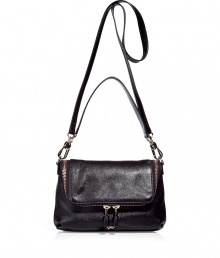 Edgy-cool zip details and super shiny leather add a downtown-ready attitude to this versatile bag from cult-favorite accessory designer Anya Hindmarch - Front flap with dual-zip pocket, convertible carrying handle and shoulder strap, back zip pocket - Perfect for toting around your daily essentials, work, or stylish travel