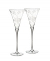 Fresh pick. Delicate florals flourish on this resplendent set of crystal toasting flutes from Marquis by Waterford, gracing any occasion with refined sophistication.