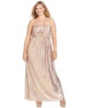 Tiny pleats amplify the metallic shimmer of Jessica Simpson's latest plus size gown and a twist of fabric just below the bust makes the silhouette super flattering!