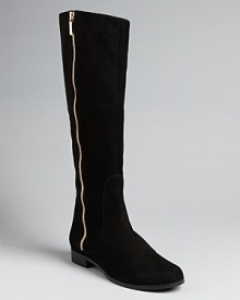 Quietly luxe, these Max Mara boots are perfectly punctuated by golden zippers: flatly stylish.