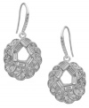 Sparkle suitable for any special occasion. Carolee's stunning style features a cut-out circular design that shines with the addition of glittering glass accents. Set in silver tone mixed metal. Approximate drop: 1-1/2 inches.