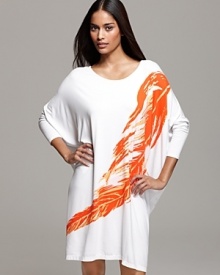 A large dolman sleeve jersey tunic with an edgy feather graphic print on front.