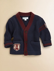 An essential V-neck cardigan in soft flat-knit cotton is accented with stripes and varsity-inspired details for a collegiate look.V-neckLong sleevesButton-frontHand welt pocketsRibbed cuffs and hemCottonMachine washImported Please note: Number of buttons may vary depending on size ordered. 