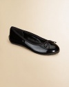 A timeless ballet flat becomes a seasonal staple in shiny patent leather with grosgrain trim and bow detail.Elastic strapPatent leather upperLeather liningRubber soleImported