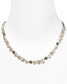 Judith Jack's pearl collar necklace with cubic zirconia stations sparkles with timeless charm. Wear this stunning, vintage-inspired adornment for an instant wow factor.