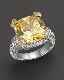 Faceted canary crystal stone ring is offset by four heart-shaped diamond accents set in 18 Kt. gold. Textured sterling silver band. Designed by Judith Ripka.