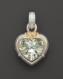 Faceted peridot crystal heart is framed in 18 Kt. gold and sterling silver; with diamond accents. Chain sold separately. Designed by Judith Ripka