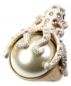 Dive deep for fierce fashion! Octopus stretch ring by RACHEL Rachel Roy crafted from worn gold-tone mixed metal with glass stone accents. Ring adjusts to fit finger.