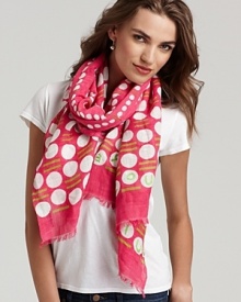 A cascading dot pattern embellishes this bright pink oblong scarf from Juicy Couture, a must-have accessory for those chilly summer days.