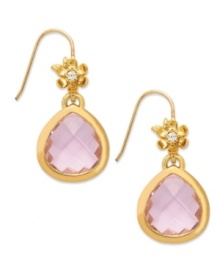 A bouquet beauty. These teardrop earrings from Juicy Couture captivate with floral accents embellished with clear glass stones, sitting atop a faceted pink-hued glass teardrop. Crafted in 14k gold-plated mixed metal. Approximate drop: 1-1/4 inches.