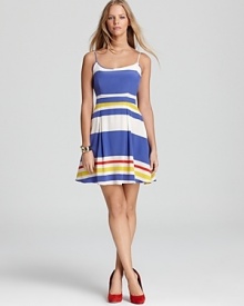 Seaside-inspired stripes wind around the fit-and-flare silhouette of this Juicy Couture sundress. Team with oversized shades and rock the retro trend of the moment.