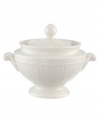 Distinguished by rich relief patterns in milky white china, the Cellini collection brings European classicism to the table. Shaped like a miniature tureen, ridged sugar bowl has a braided design and finial top. Microwave and dishwasher safe.