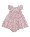 A charmingly traditional dress in crisp cotton features a dogwood floral pattern for a sweet summer look.