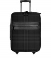 Travel in iconic style with Burberry Londons black check carry-on - Tonal leather trim, zip-around closure, zippered front pocket, retractable handle at back, reinforced base with wheels - The perfect size for carrying on-board, or for packing away chic weekend essentials