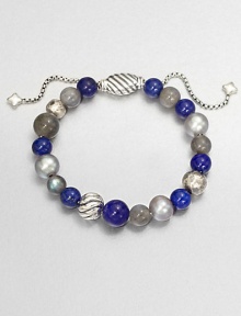 From the Spiritual Bead Collection. A beautiful beaded style with lapis labordarite and freshwater pearls on a sterling silver box chain. Lapis, labordarite and freshwater pearlsSterling silverDiameter, about 2 adjustableBeaded closureImported 