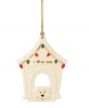 Deck the tree with your favorite pup this Christmas. This precious porcelain dog house is painted with red and green lights and finished with gold detailing.