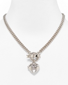 A pave logo-embossed heart locket on chainlink necklace with bow toggle closure from Juicy Couture.