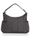 Dress up your casual look with this Macy's Exclusive purse - a chic logo jacquard pattern with easy-access side pockets make it a natural for a Saturday downtown.