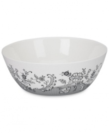 Oleg Cassini weaves a table of playful sophistication with the Ava vegetable bowl, featuring lacy flowers and dots in timeless black and white.