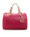 MICHAEL Michael Kors styles the classic purse in super-soft leather and adds bold hardware for a chic, modern finish.