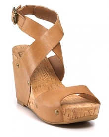 Broad straps in luxe leather wrap Lucky Brand's '70s-inspired wedges--the perfect match to wide-leg denim.