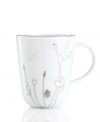 Wildflowers take off on glazed white porcelain, sparkling as they tumble aimlessly around the Platinum Silhouette mug from Charter Club dinnerware. The dishes have a banded edge that adds a classic touch to a pattern with modern spirit.