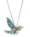 For style that's unflappable. A pretty hummingbird adorns a trendy long chain in this stylish Fossil pendant. A sweet mix of light blue and green glass accents add a touch of spring. Set in vintage silver tone mixed metal with a lobster claw clasp. Approximate length: 32 inches + 2-inch extender. Approximate drop: 1-1/4 inches.