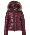 A sleek outer shell and elegant raccoon trim lend this Duvetica down jacket its sporty and stylish edge - In a lighter weight, wind- and water-resistant burgundy polyamide - Slim cut fits close to the body for extra warmth and tapers through waist - Full zip,  fur-trimmed hood and diagonal zippered pockets at sides - Perfect for cold weather casual looks including jeans, cords, chinos and ski pants