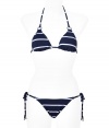 Stylish bikini in fine, synthetic fiber blend - Elegant and on-trend navy and white stripe motif, silver ring hardware - Especially comfortable and flattering, thanks to a generous touch of stretch - Triangular halter top with adjustable cups ties at back and nape of neck - String brief ties at hips, offers modest coverage at rear - Sexy and sophisticated, a must for you next vacation or beach getaway - Wear solo or layer beneath a caftan and wedge sandals