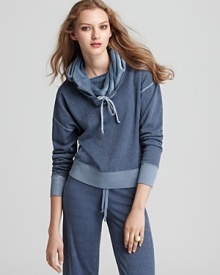 A soft, chunky cowlneck doubles as a hood in this Juicy Couture pullover.