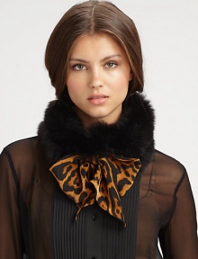 Make a statement with this luxurious, tie front design trimmed in dyed fox fur. 30% virgin wool/30% cashmere/40% silkAbout 7 X 59Specialist dry cleanMade in Italy Fur origin: Finland 