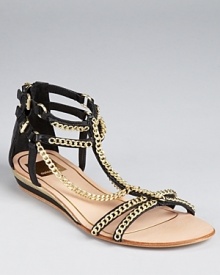 Embellished in golden chains, these hardware-heavy Dolce Vita sandals lend a luxe look.