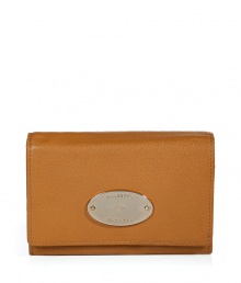 Stylish wallet in supple, caramel brown leather - Practical and polished compact rectangular style - Buffalo leather has a slight sheen - Pale gold, oval Mulberry plaque - Popper closure - Eight credit or business card slots - Expandable pocket for bills - Two slip pockets - Zip coin compartment - Understated yet undeniably chic, also makes a superb gift