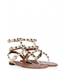 Opt for the iconic this season with Valentinos rockstud embellished sandals, guaranteed to give that covetable edge to your outfit - Light ivory leather buckled straps adorned with platinum-toned rockstuds, powder leather footbed detail - Flat - Wear with everything from ankle jeans and tees to fun cocktail dresses