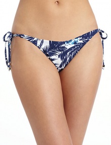 THE LOOKAllover palm leaf printSide ties with silvertone hardwareElastic waist and leg openingsTHE MATERIAL80% nylon/20% spandexFully linedCARE & ORIGINHand washMade in USAPlease note: Bikini top sold separately. 