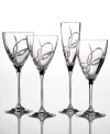 Only Vera Wang could capture elegance so gracefully and tie it up with a bow. With a sleek silhouette and narrow stem, this etched crystal wine glass lends refined whimsy to every occasion. Shown second from left.