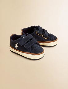 Crafted in lush suede, these adorable leather sneakers feature a double grip tape closure and signature pony embroidery.Double grip tape closureLeather upperLeather liningPadded insoleLeather soleImported