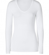 Effortlessly feminine, this super soft long sleeve tee from Majestic is a new-season must-have basic - Soft V-neckline, long sleeves, stitched trim - Loosely fitted - Pair with leather leggings and statement sneakers