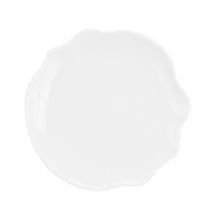 An organically scalloped, off-white dinnerware pattern that contributes elements of both texture and design to your dining experience.