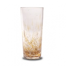 Each highball glass is carefully hand-blown in Florence by experienced craftsmen who perform a ten-step, six-hour process, blending Venetian color chips with silvery sparkles for a scintillating confluence of shimmer and hue.