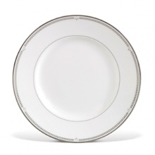 Sloane Square features a chic and simple tailored band, with details of platinum dots, which create a clean and sophisticated look. The accent plate features a wide band of gray mica with true geometric flare in the quadrant design around the border of the plate. Made in England.