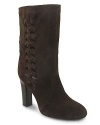 Woven sides add bohemian charm to these ladylike suede boots from Delman.