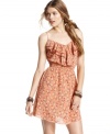 Tiers of ruffles add feminine flourish to this floral-print day dress from American Rag!