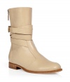 Stylish nude half boots from Laurence Dacade - These functional and fashion-forward boots bring pared-down chic to your daytime look - Calf-length, side zip closure, ankle strap detail, flat style - Wear with skinny jeans, a plaid button-down and a leather bomber jacket