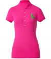 Detailed in breathable cotton stretch mesh, Ralph Laurens big pony polo is a cool modern take on this iconic style - Small collar, button placket, short sleeves, oversized shiny green embroidered polo player at chest, slit sides, high-low hemline - Slim fit - Wear with your favorite jeans and just as bright loafers