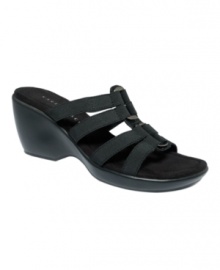 A strap-happy sandal. With stretchy elastic straps accented by metal rings, the Stacy wedge sandals by Karen Scott are a comfortable twist on hot summer style!